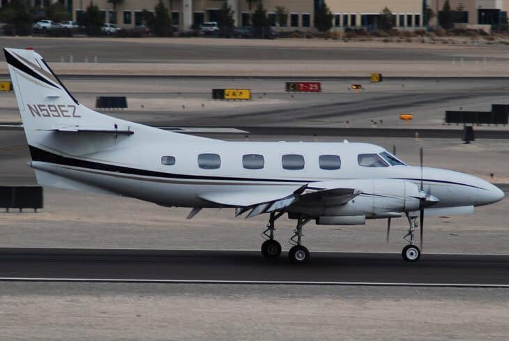 Swearingen Merlin turboprop N59EZ taxiing on an airport apron