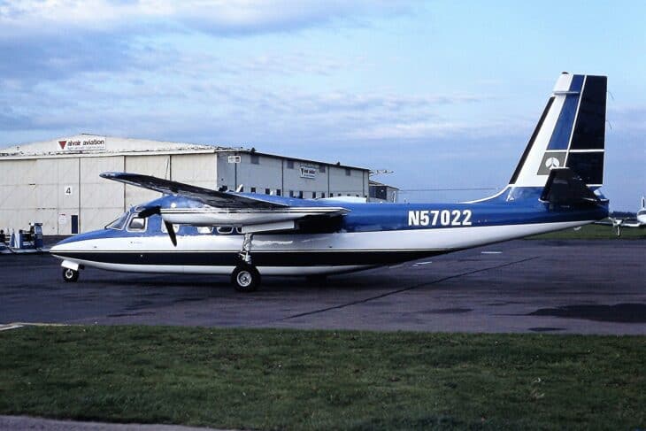 Rockwell Commander 685 N57022 in blue and white paint taxiing on the ramp
