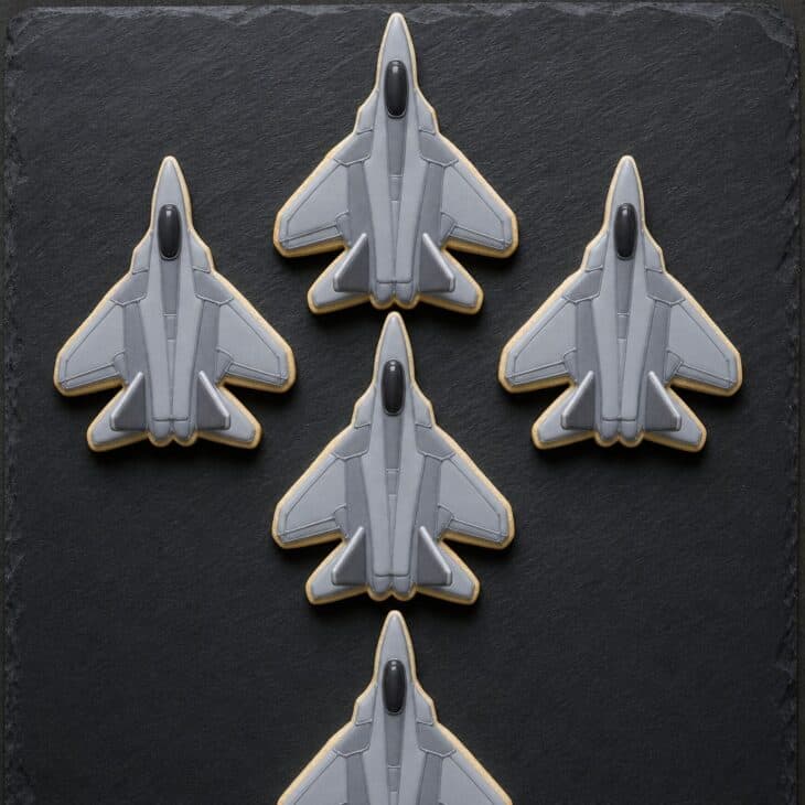 A gray fighter set laid out in a four-ship diamond.