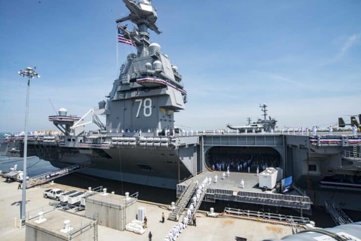 Sailors man the rails of USS Gerald R. Ford during its commissioning ceremony at Naval Station Norfolk in July 2017