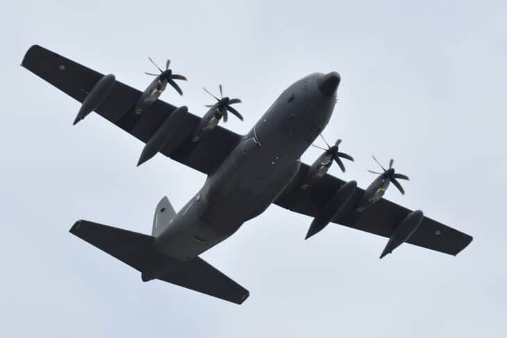 French Air Force Lockheed C-130 Hercules in flight seen from below