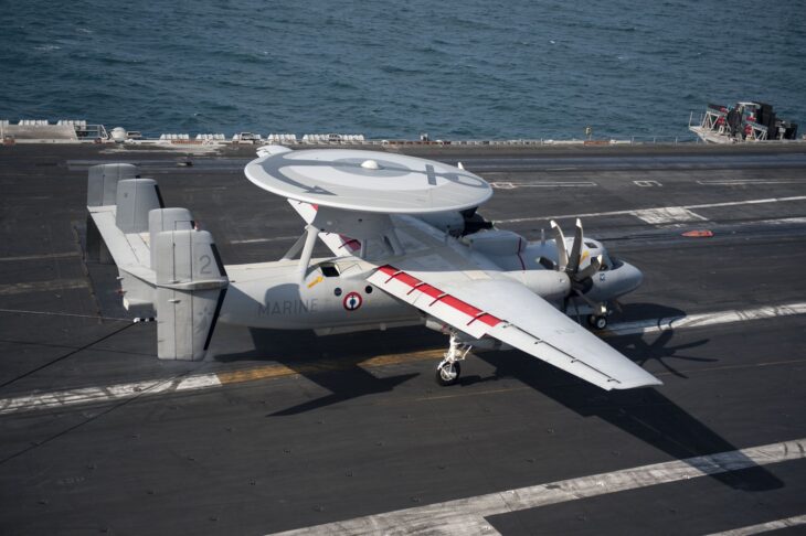 French Navy E-2C Hawkeye radar plane with its rotodome on a carrier flight deck