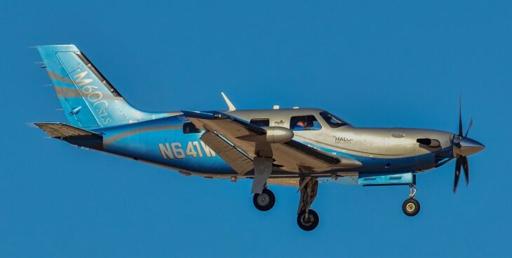 Piper M600 SLS single-engine turboprop in flight against a blue sky