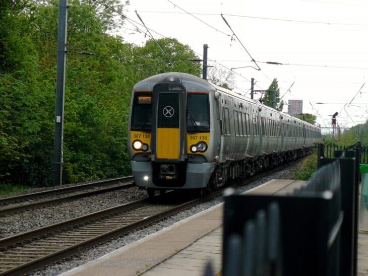 Class 387 Heathrow Express train passing Hanwell station