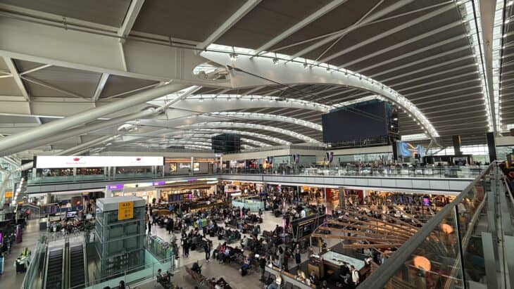 Departures hall inside Heathrow Terminal 5 with its curved roof