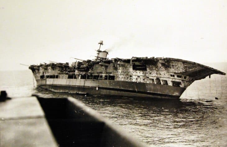 HMS Ark Royal (91) heavily listing and low in the water after the U-81 torpedo hit on November 13, 1941