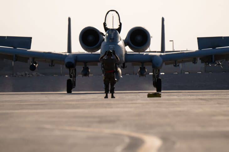Head-on view of an A-10C Thunderbolt II on the ramp with its twin engines and nose-mounted gun area facing the camera