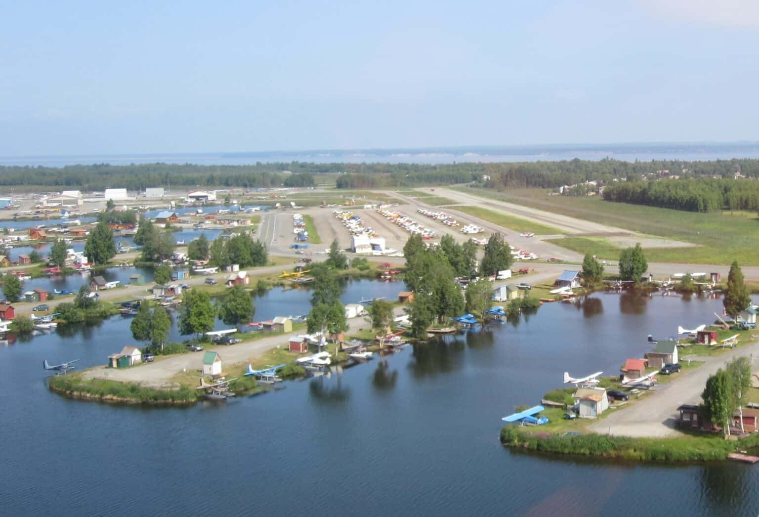 Aerial view of the Lake Hood floatplane docks and gravel strip beside Anchorage airport in Alaska