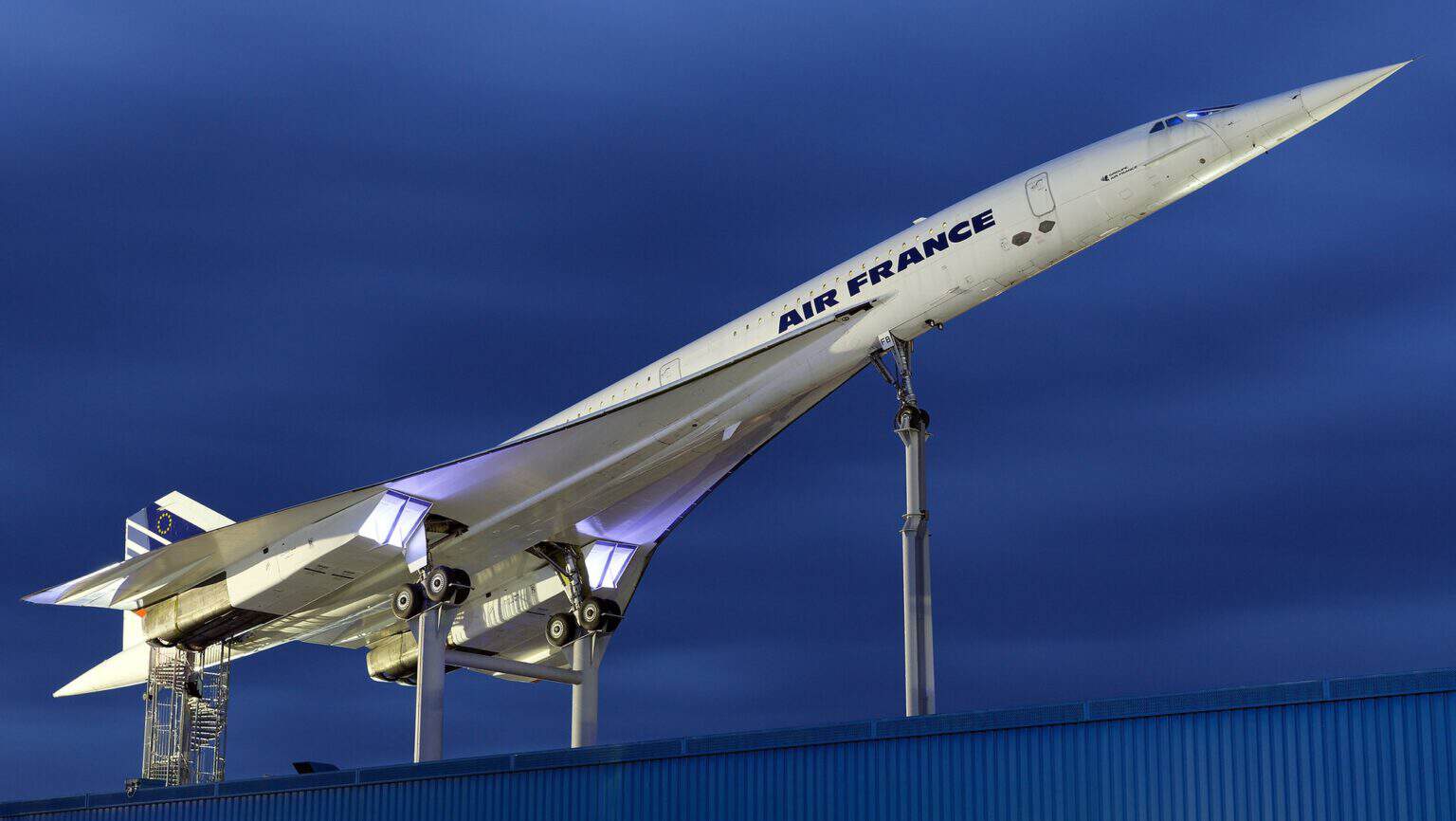 Air France Concorde F-BVFB mounted nose-up on the roof of the Technik Museum Sinsheim at dusk