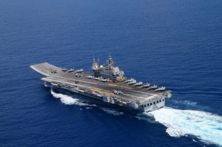 INS Vikrant at sea with aircraft on the flight deck