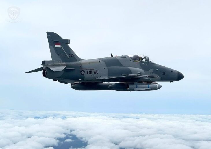 Indonesian Air Force Hawk 209 in flight above cloud