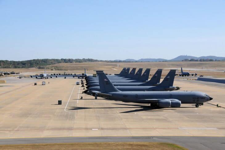 A row of US Air Force KC-135 Stratotanker aircraft parked on a flightline