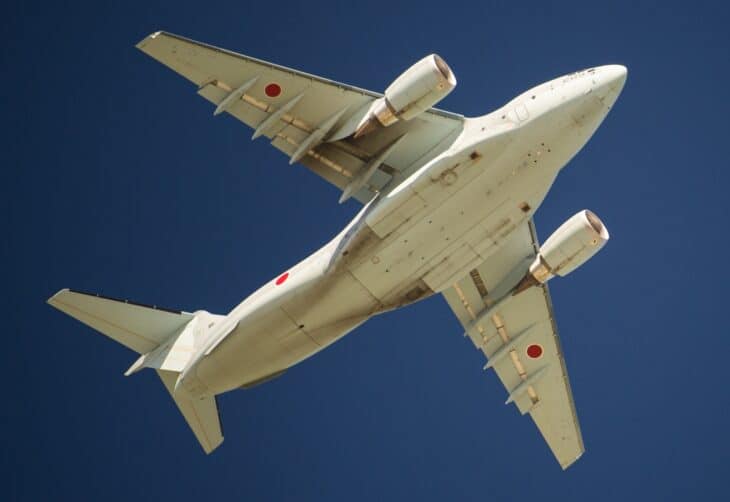 JASDF Kawasaki C-2 transport banking overhead with its high wing and twin engines