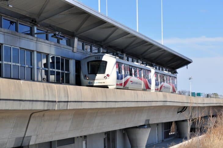 AirTrain JFK car at the elevated Howard Beach station in Queens