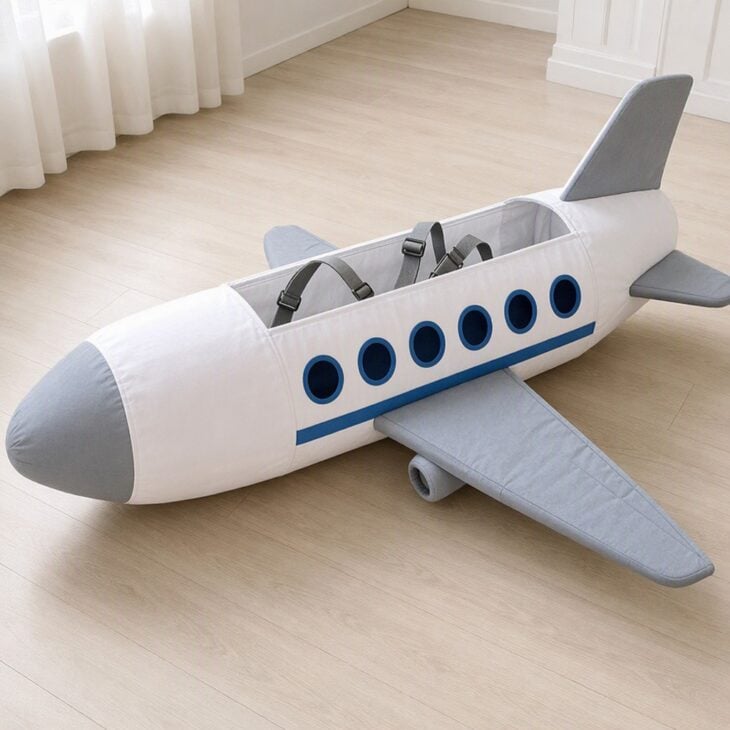 A row of round windows and a long blue stripe is the airliner look.