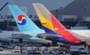 Korean Air and Asiana Airlines Airbus A380 tails at Los Angeles