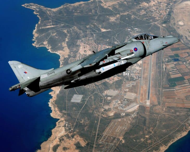 Harrier jet flying high over RAF Akrotiri and its runway on the Cyprus coast
