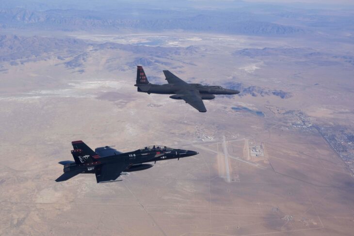 A Navy F/A-18F Super Hornet and an Air Force U-2S flying over Naval Air Weapons Station China Lake in November 2023