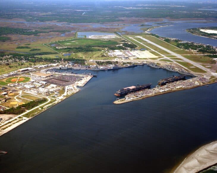 Aerial view of Naval Station Mayport's basin with two aircraft carriers moored in 1993