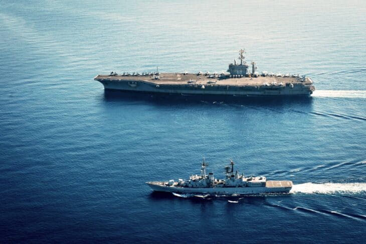 USS Nimitz underway in the Mediterranean with an Italian destroyer alongside
