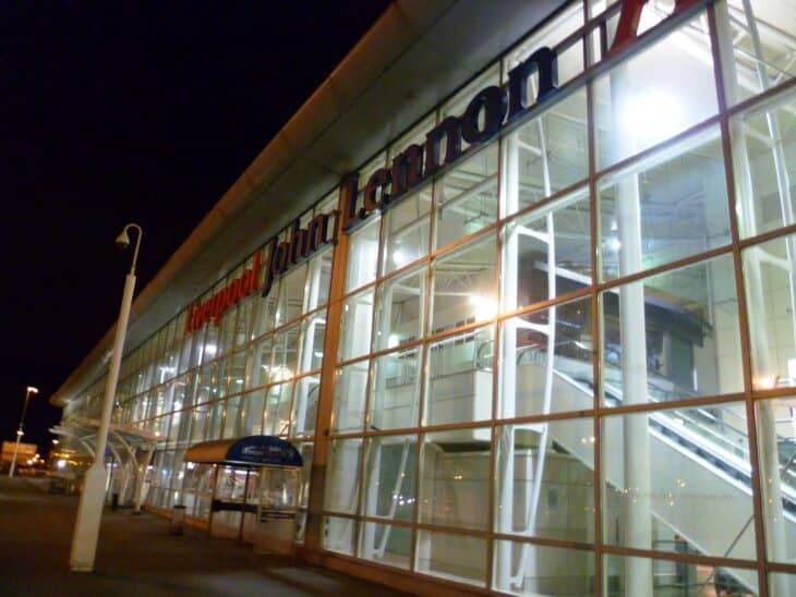Glass frontage of the terminal at Liverpool John Lennon Airport at night