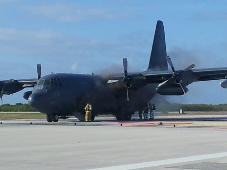 CC-130H Hercules 130342 on the runway with smoke coming from its engines
