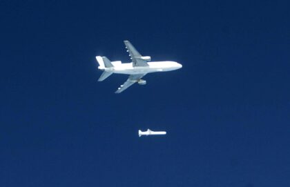 Stargazer L-1011 TriStar high over the Pacific with a Pegasus rocket falling away beneath it after release