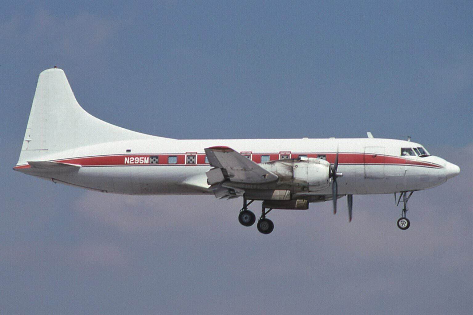 Convair 240 twin-engine propliner N295M with landing gear down on approach to Miami