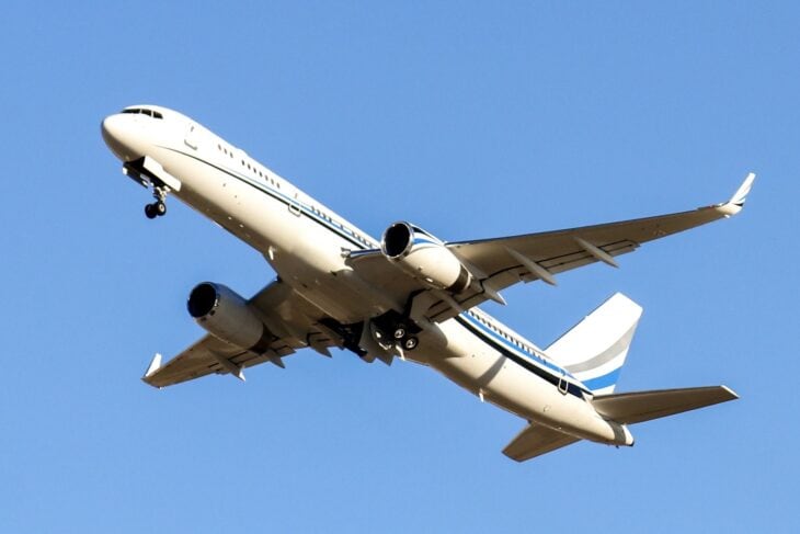 Dallas Mavericks Boeing 757 climbing out after takeoff from Dallas Love Field