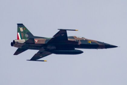 Mexican Air Force Northrop F-5 Tiger II fighter in flight with camouflage paint and Mexican tail markings