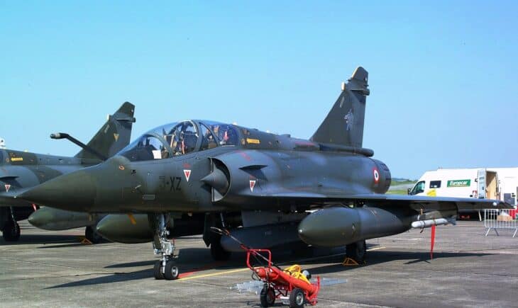 Two-seat Mirage 2000D of the 3rd Fighter Wing parked on a ramp with its tandem cockpit visible