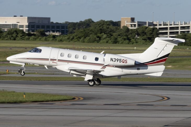 NetJets Embraer Phenom 300 N395QS rolling out after landing