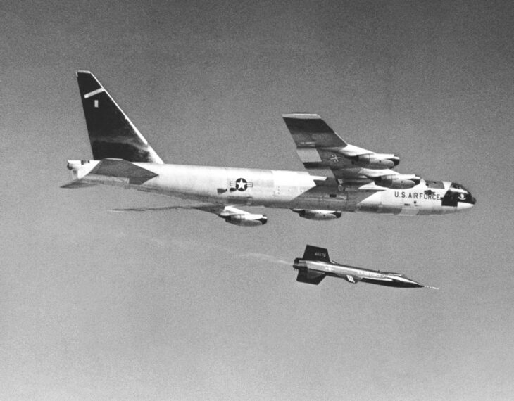 The North American X-15 falling away from the B-52 mothership at the moment of launch