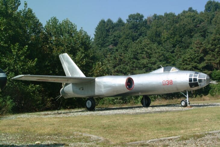 Harbin H-5 bomber, the Chinese-built Il-28, parked on grass with the number 038