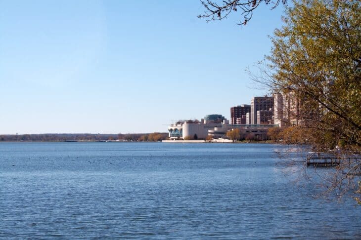Lake Monona in Madison, Wisconsin, with the shoreline and city buildings across the water