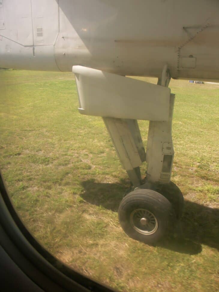 Main landing gear of a de Havilland Dash 8-100 seen from a passenger window