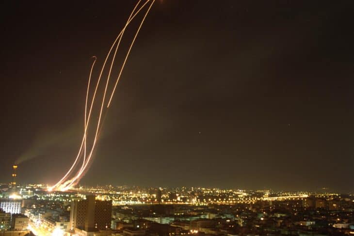 Patriot missile trails streaking over the lights of Tel Aviv at night as they climb toward an Iraqi Scud in February 1991