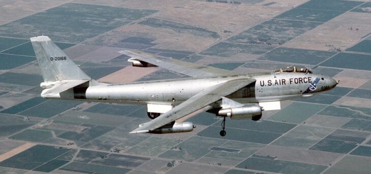 Boeing B-47 Stratojet in flight over farmland