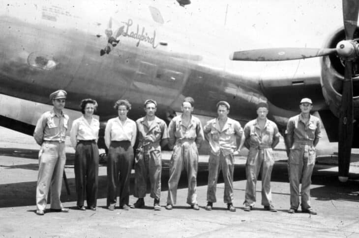 Women Airforce Service Pilots and crew standing in front of the B-29 Ladybird