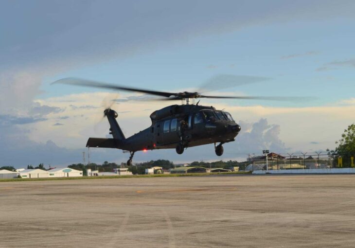 Philippine Air Force S-70i Black Hawk lifting off at dusk