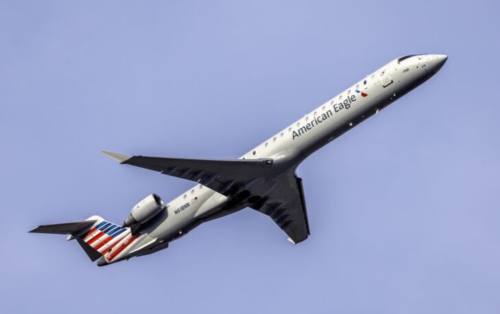 PSA Airlines CRJ-900 in American Eagle livery climbing out