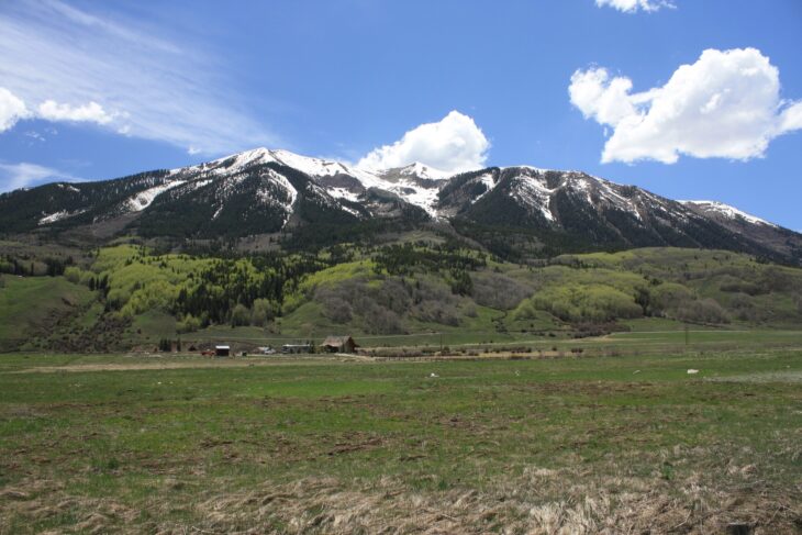 Whetstone Mountain rising above ranch land in the West Elk Mountains of Colorado