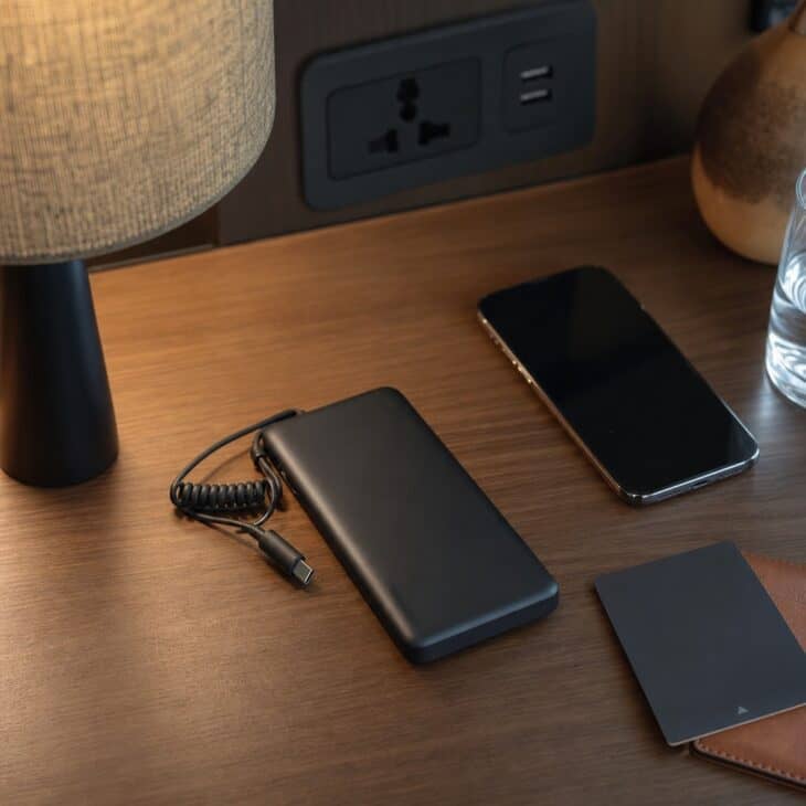A slim power bank covers long days when outlets are scarce.