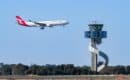 QF124 Stopped 394 Feet From a Landing Dash 8 at Sydney, and Investigators Are Looking at Tower Staffing