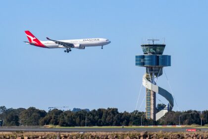 QF124 Stopped 394 Feet From a Landing Dash 8 at Sydney, and Investigators Are Looking at Tower Staffing