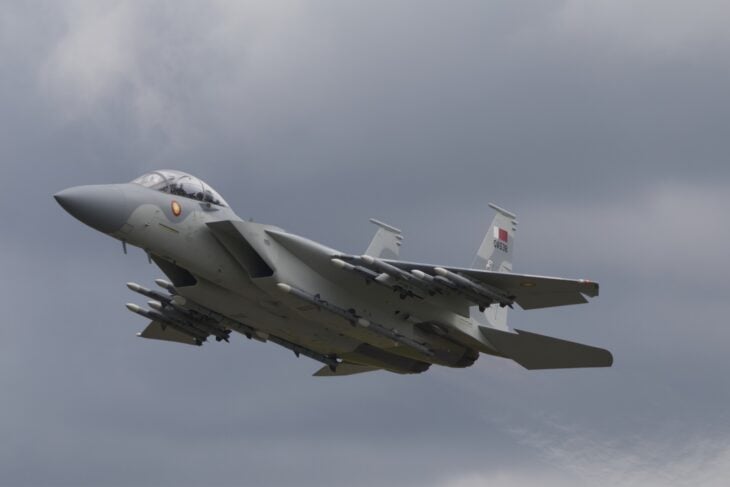 Qatar Emiri Air Force F-15QA Ababil in a banked climb with air-to-air missiles under the wings