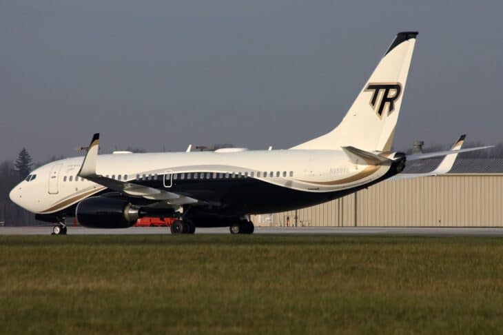 Boeing 737-7CG Business Jet N950TR parked on the ramp with the TR tail logo