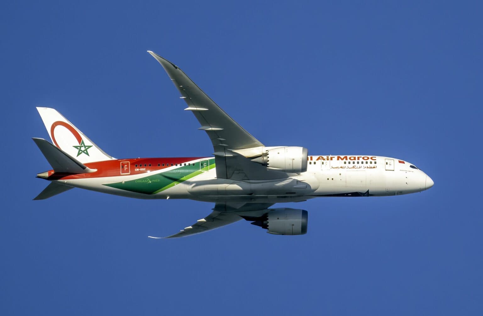 Royal Air Maroc Boeing 787-8 Dreamliner CN-RGC in flight against a deep blue sky