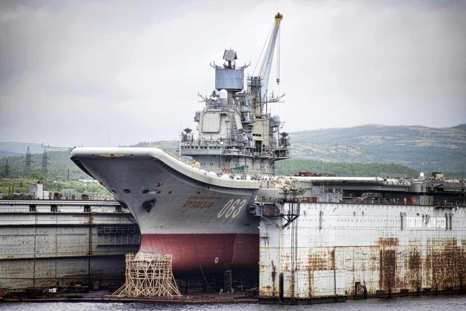 Admiral Kuznetsov aircraft carrier in a floating dry dock at Murmansk