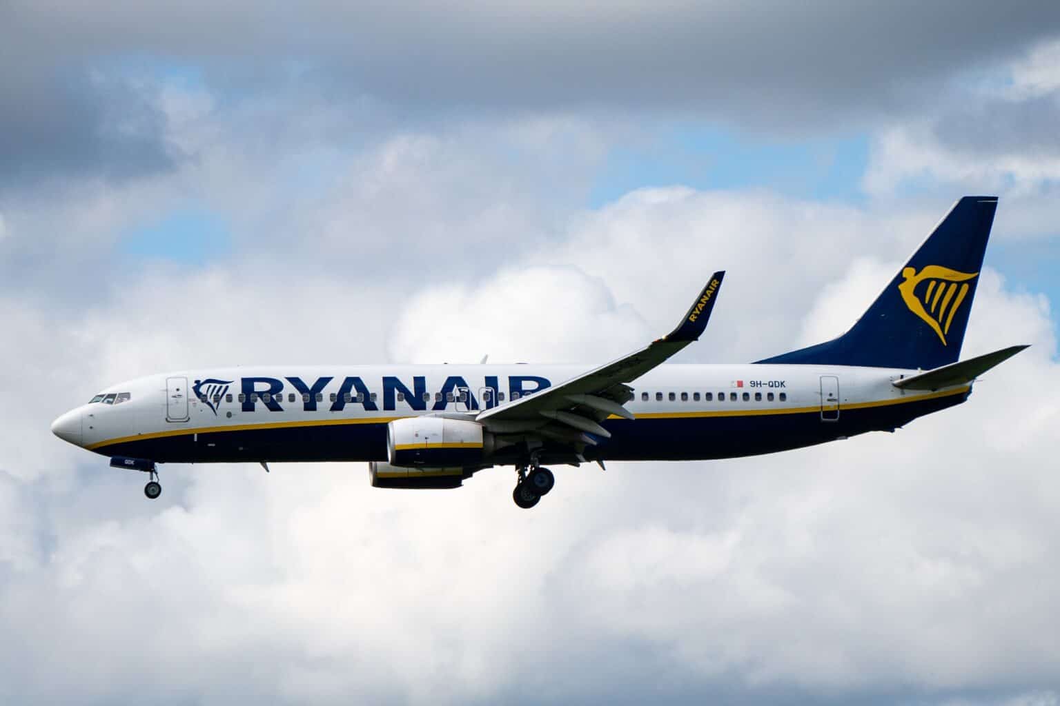 Ryanair Boeing 737-800 9H-QDK on approach with gear down against a cloudy sky